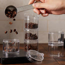 ANKOMN QuarterSeal X7 modular single‑dose coffee organizer—clear plastic with twist‑to‑seal lid